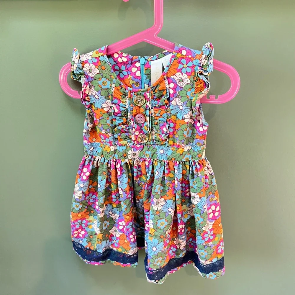 Girls Playful Floral Print Dress with Ruffle Sleeves‎ & Button Detail
